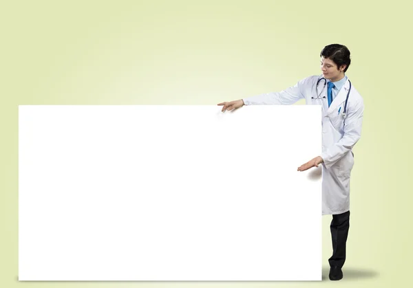 Doutor com banner — Fotografia de Stock