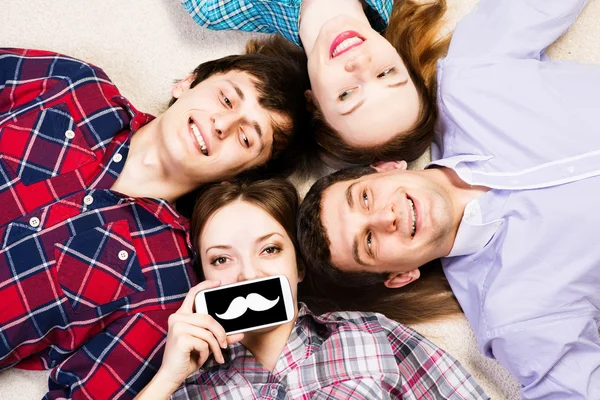 Four people lie together — Stock Photo, Image