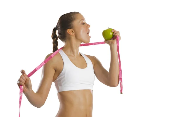 Young attractive woman with measuring tape — Stock Photo, Image