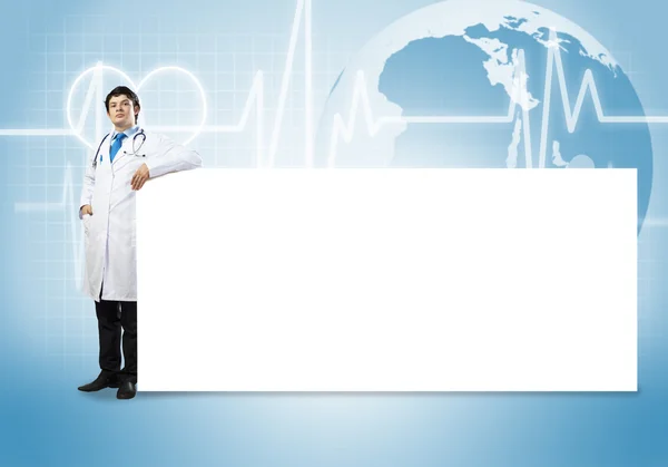 Medico con banner — Foto Stock