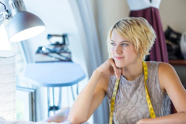 Needlewoman with tape on neck — Stock Photo, Image