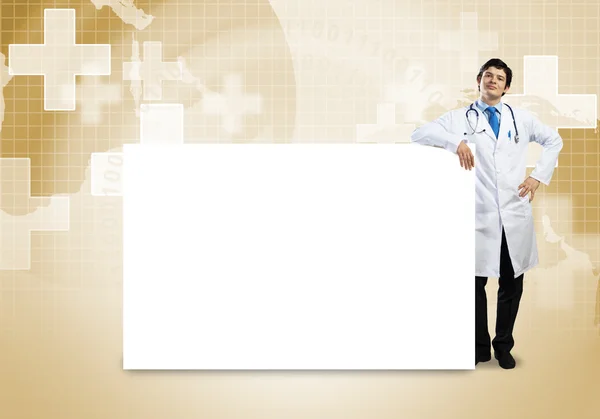 Medico con banner — Foto Stock