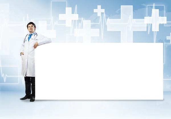 Doctor with banner — Stock Photo, Image