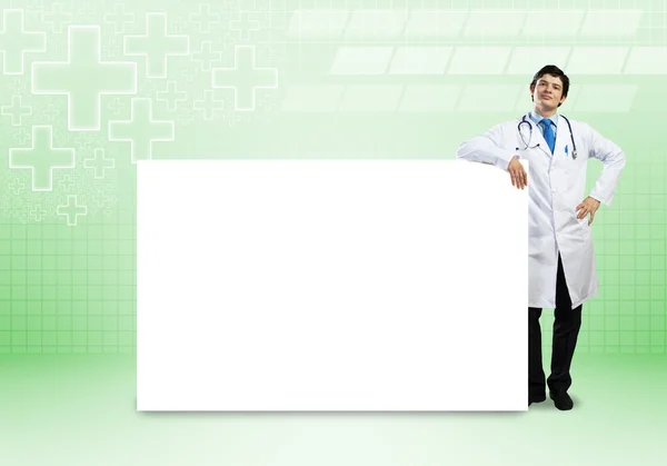 Medico con banner — Foto Stock