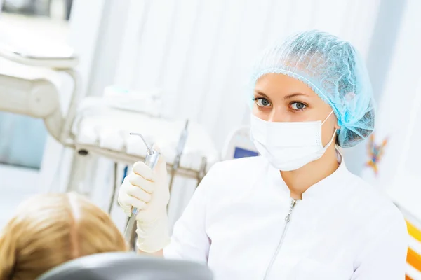 Dentist inspecting patient — Stock Photo, Image