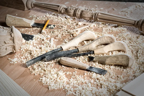Carpenter's tools lying among sawdust — Stock Photo, Image