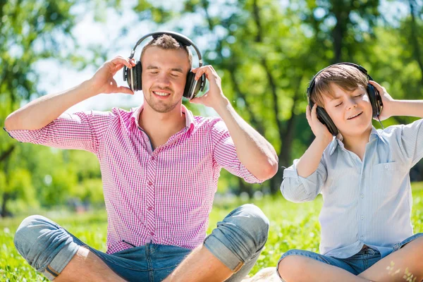 Father and son in park — Stock Photo, Image