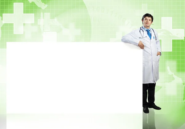 Doctor with banner — Stock Photo, Image