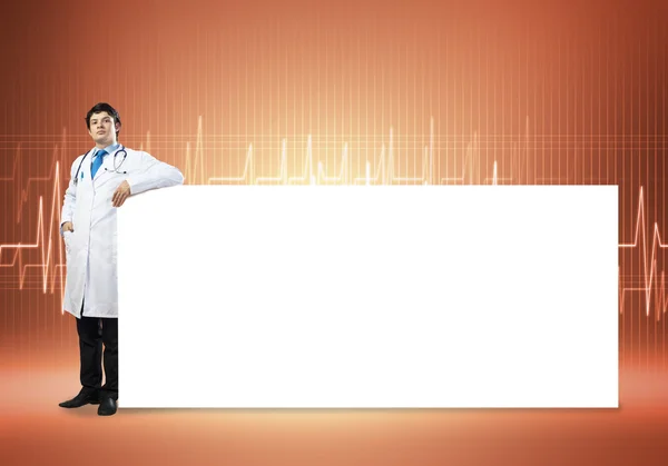 Doctor with banner — Stock Photo, Image