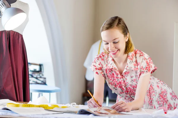 Young attractive needlewoman — Stock Photo, Image