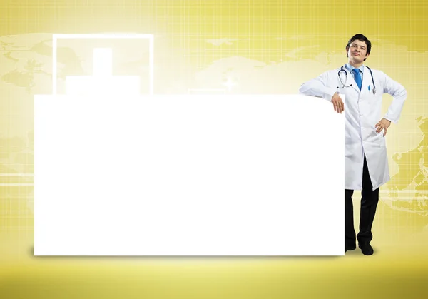 Medico con banner — Foto Stock