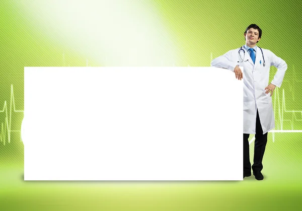 Medico con banner — Foto Stock