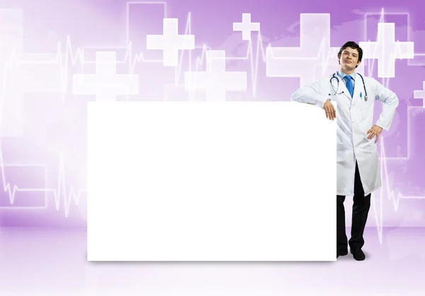 Doctor with banner — Stock Photo, Image