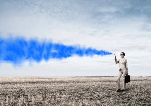 Businesswoman using spray — Stock Photo, Image