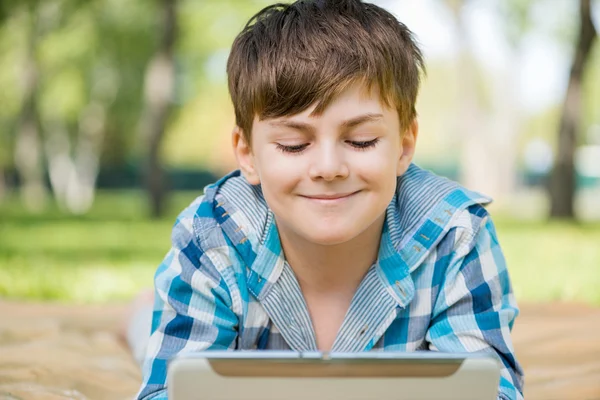 Boy in summer park — Stock Photo, Image