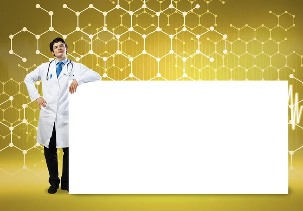 Doctor with banner — Stock Photo, Image