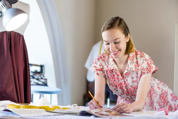 Young pretty needlewoman — Stock Photo, Image