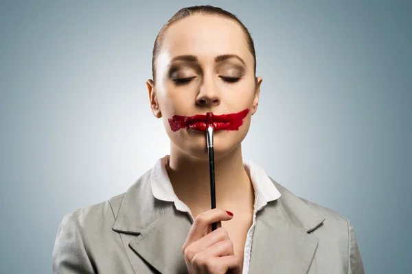 Young woman with vivid red mouth — Stock Photo, Image