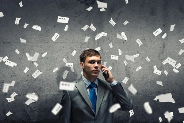 Crying businessman with mobile — Stock Photo, Image