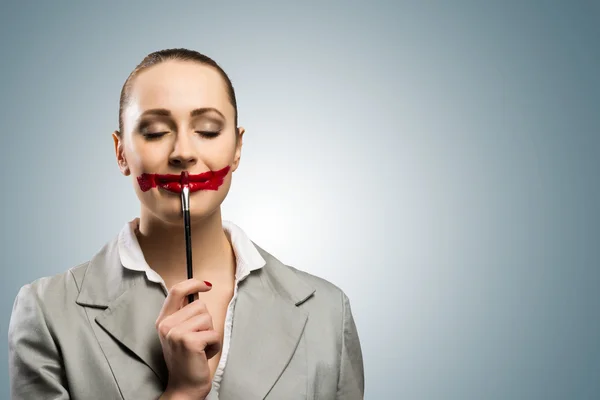 Young woman with vivid red mouth — Stock Photo, Image