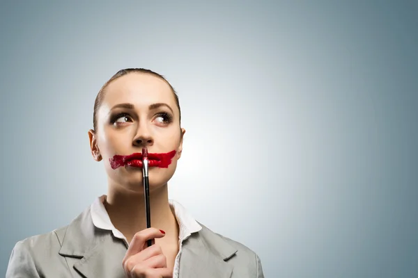 Young woman with vivid red mouth — Stock Photo, Image