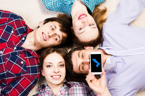 Four people lie together — Stock Photo, Image