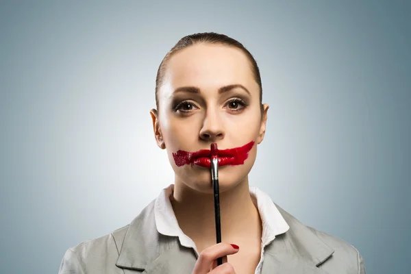 Young woman with vivid red mouth — Stock Photo, Image