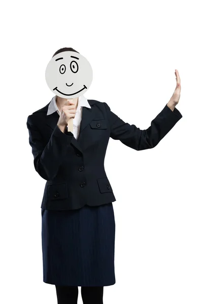 Businesswoman hiding face behind mask — Stock Photo, Image