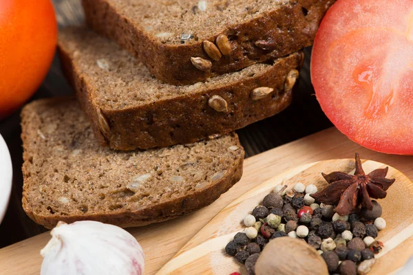 Vegetables, bread and spices — Stock Photo, Image