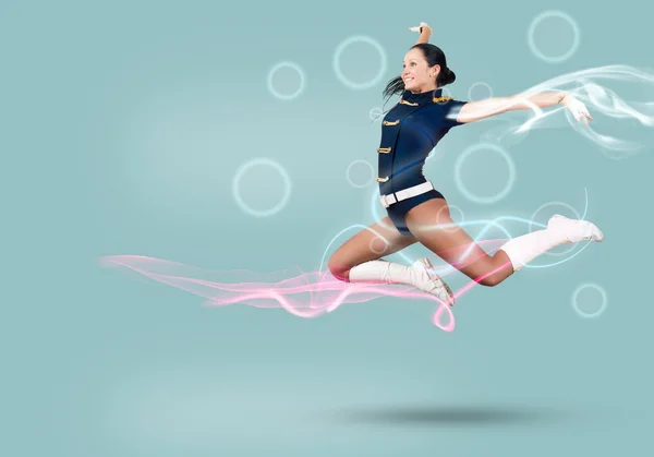 Cheerleader girl jumping high — Stock Photo, Image