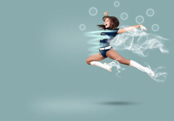 Cheerleader girl jumping high — Stock Photo, Image