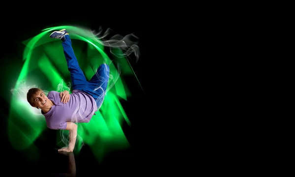 Breakdancer standing on hand — Stock Photo, Image