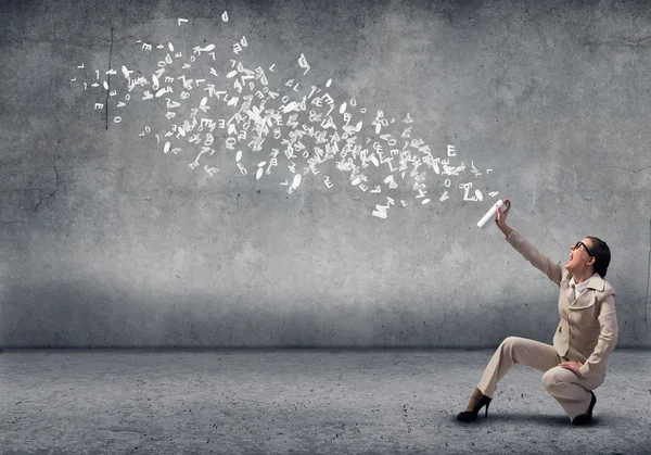 Businesswoman using spray — Stock Photo, Image