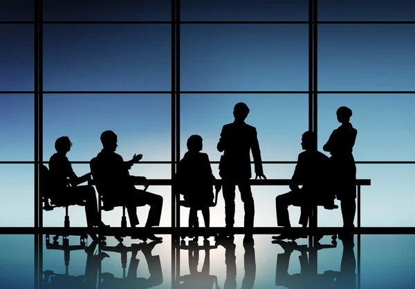 Businessteam seduta tavola rotonda — Foto Stock