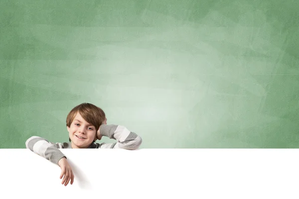 Boy with blank advertising board — Stock Photo, Image
