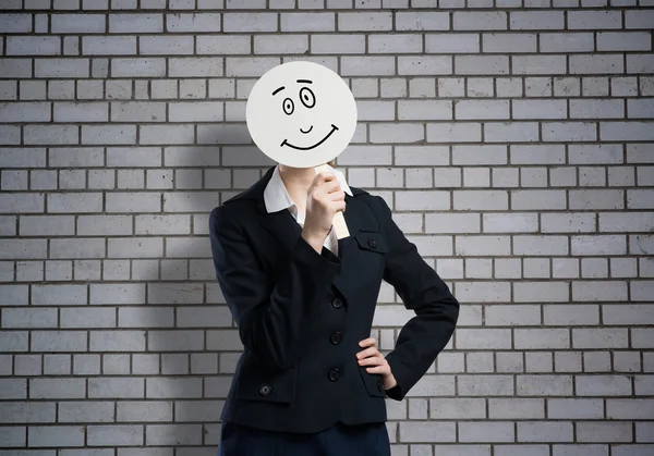 Unrecognizable businesswoman hiding her face — Stock Photo, Image