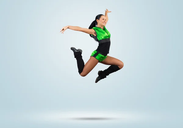 Cheerleader girl jumping high — Stock Photo, Image