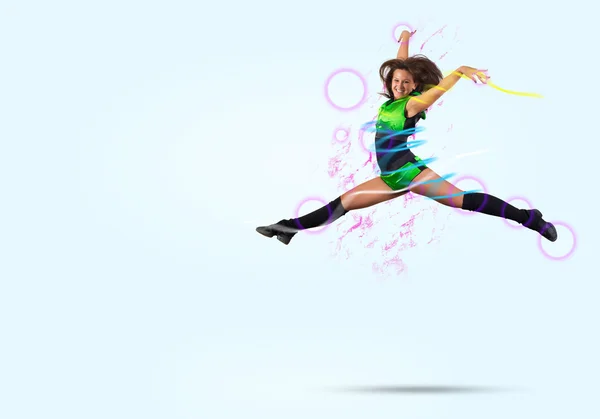 Cheerleader girl jumping high — Stock Photo, Image