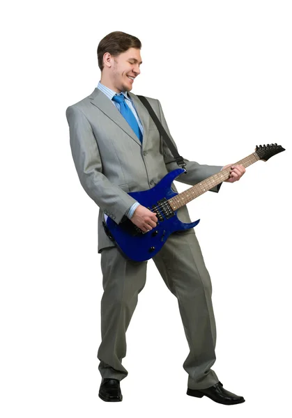 Businessman playing guitar — Stock Photo, Image