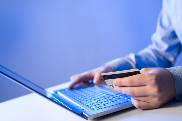 man using credit card