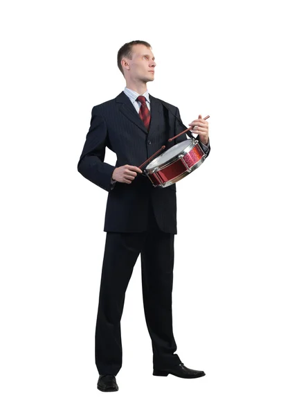 Businessman playing drums — Stock Photo, Image