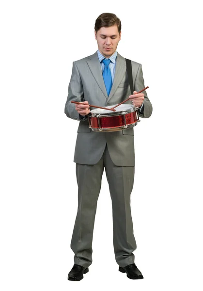 Businessman playing drum — Stock Photo, Image