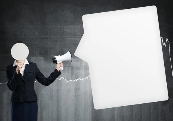 Businesswoman with megaphone and diagrams — Stock Photo, Image