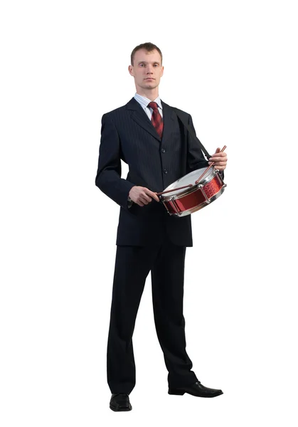 Businessman playing drum — Stock Photo, Image