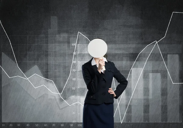 Businesswoman hiding her face behind mask — Stock Photo, Image