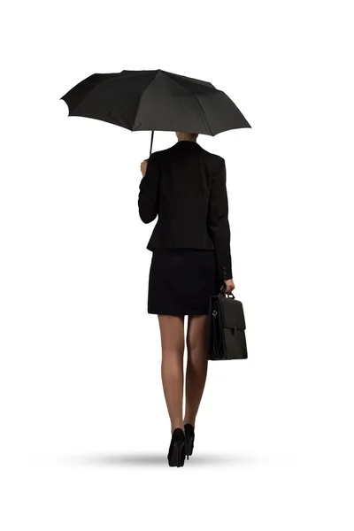 Business woman holding umbrella — Stock Photo, Image