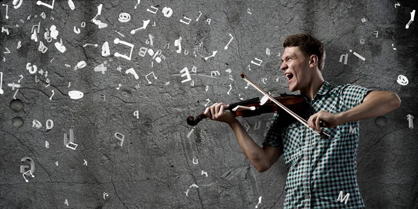 Virtuoso toca violino — Fotografia de Stock