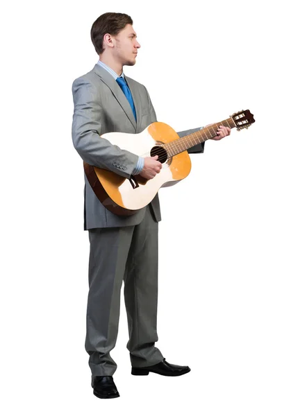 Бизнесмен играет на гитаре — стоковое фото