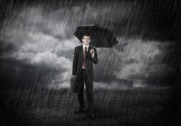 Young  Businessman with umbrella — Stock Photo, Image