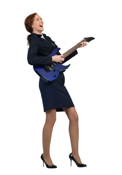 Cheerful businesswoman playing electronic guitar — Stock Photo, Image